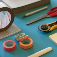 A set of tools laid out on a work surface.